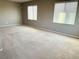 This carpeted, blank canvas bedroom is the perfect location for an owner to unwind and relax at 664 Forest Peak St, Henderson, NV 89011
