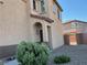 Charming home with stucco facade, manicured landscaping, and inviting front entrance at 664 Forest Peak St, Henderson, NV 89011