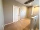 This loft space features carpet flooring and offers versatility as an office, play area, or reading nook at 664 Forest Peak St, Henderson, NV 89011