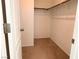 This walk-in closet features ample space and convenient shelving for optimized storage solutions at 664 Forest Peak St, Henderson, NV 89011