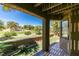 View from back patio overlooking golf course and manicured landscaping with beautiful desert plants at 7132 Mission Hills Dr, Las Vegas, NV 89113