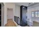 Hallway with modern staircase and a view of the backyard at 7132 Mission Hills Dr, Las Vegas, NV 89113