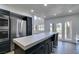 Beautiful kitchen area featuring stainless steel appliances and easy outdoor access at 7132 Mission Hills Dr, Las Vegas, NV 89113