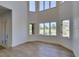 Bright living room with large windows overlooking a golf course at 7132 Mission Hills Dr, Las Vegas, NV 89113