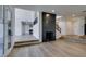 Open concept living room with fireplace, light wood floors, and modern design at 7132 Mission Hills Dr, Las Vegas, NV 89113