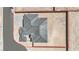 Overhead view of a newly constructed home featuring a desert landscape, with a paved driveway and perimeter wall at 7141 Painted Skyline St, Las Vegas, NV 89118