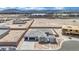 Newly constructed home features a desert landscape, with stone accents, a paved driveway and a spacious two-car garage at 7141 Painted Skyline St, Las Vegas, NV 89118