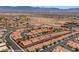An aerial view of charming, well-maintained homes with red roofs in a desert community at 731 Appletree Ln, Mesquite, NV 89027