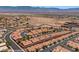 An aerial view of charming, well-maintained homes with red roofs in a desert community at 731 Appletree Ln, Mesquite, NV 89027