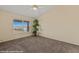 Vaulted ceiling bedroom with large window offering scenic neighborhood views at 731 Appletree Ln, Mesquite, NV 89027