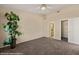 A spacious bedroom with neutral walls and plush carpet at 731 Appletree Ln, Mesquite, NV 89027