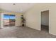 Bright bedroom featuring balcony access, neutral walls and carpet flooring at 731 Appletree Ln, Mesquite, NV 89027
