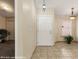 Inviting foyer featuring tile flooring, neutral walls, and decorative lighting fixtures at 731 Appletree Ln, Mesquite, NV 89027
