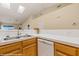 Well-lit kitchen with stainless steel sink and white tiled backsplash in a home at 731 Appletree Ln, Mesquite, NV 89027