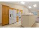 Bright kitchen featuring modern appliances, ample cabinet space, and tiled flooring at 731 Appletree Ln, Mesquite, NV 89027
