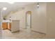 Bright kitchen with tile floors, neutral walls, and modern appliances at 731 Appletree Ln, Mesquite, NV 89027