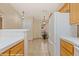 Bright eat-in kitchen showcasing white appliances and tiled flooring at 731 Appletree Ln, Mesquite, NV 89027