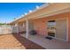 Enjoy the desert view from this home's covered patio, and sliding glass door to the home at 731 Appletree Ln, Mesquite, NV 89027