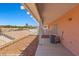 Covered patio space with white pergola, AC unit and a view of the desert at 731 Appletree Ln, Mesquite, NV 89027