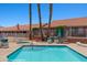 Pool view of the community pool with spa and lounge seating at 731 Appletree Ln, Mesquite, NV 89027