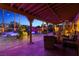 Inviting backyard patio with stylish outdoor furniture, sparkling pool and lush landscaping perfect for relaxing evenings at 741 Canary Wharf Dr, Las Vegas, NV 89178