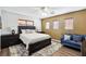 Cozy bedroom featuring warm colors, carpet, and ample natural light at 741 Canary Wharf Dr, Las Vegas, NV 89178