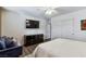 Bright bedroom with TV, dresser and closet at 741 Canary Wharf Dr, Las Vegas, NV 89178