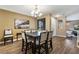 Elegant dining area with modern table and view to Gathering room at 741 Canary Wharf Dr, Las Vegas, NV 89178