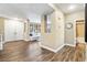 Welcoming entryway featuring wood floors and access to bathroom and living area at 741 Canary Wharf Dr, Las Vegas, NV 89178