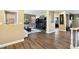 Cozy living room featuring hardwood floors, entertainment center, and a comfortable seating area at 741 Canary Wharf Dr, Las Vegas, NV 89178