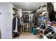 Spacious walk-in closet with ample storage, wire shelving, and carpet at 741 Canary Wharf Dr, Las Vegas, NV 89178