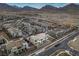 Panoramic aerial shot showcases a community with new homes and scenic mountain vistas at 752 Echelon St, Las Vegas, NV 89138