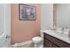 Chic half bathroom featuring modern fixtures, sleek vanity, and stylish decor, offering a convenient and elegant space at 752 Echelon St, Las Vegas, NV 89138