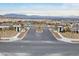 Welcoming entrance to Vertex community showcasing landscaped median and scenic mountain views at 752 Echelon St, Las Vegas, NV 89138
