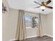 Bedroom featuring a ceiling fan, window, and curtains at 808 Vermillion Dr, Henderson, NV 89002