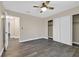 Bedroom featuring a ceiling fan, closet space, and wood-look flooring at 808 Vermillion Dr, Henderson, NV 89002