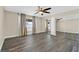 Bedroom with mirrored closet doors, ceiling fan, and neutral decor at 808 Vermillion Dr, Henderson, NV 89002