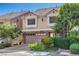 Charming two-story home with a tile roof and well-manicured landscaping at 8316 Accolade St, Las Vegas, NV 89139