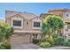 Charming two-story home featuring stucco siding, tile roof, and well-maintained landscaping at 8316 Accolade St, Las Vegas, NV 89139