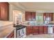 Charming kitchen featuring stainless steel appliances and granite countertops at 8316 Accolade St, Las Vegas, NV 89139