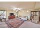 Bright living room featuring neutral tones, large windows, and a comfortable sofa at 8316 Accolade St, Las Vegas, NV 89139