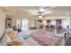 Spacious open-concept living space with a modern kitchen and dining area at 8316 Accolade St, Las Vegas, NV 89139