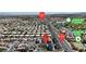 Overhead view of a vibrant residential area showcasing well-maintained homes and modern townhouses at 8436 Noir Ave, Las Vegas, NV 89129