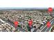 Overhead view of a well-populated neighborhood with a variety of homes and easy access to nearby streets at 8436 Noir Ave, Las Vegas, NV 89129