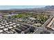 Stunning aerial view of a Primary-planned community featuring lush landscaping and convenient access to amenities at 8436 Noir Ave, Las Vegas, NV 89129