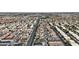 Expansive aerial view showcasing a meticulously planned community with tree-lined streets and diverse home styles at 8436 Noir Ave, Las Vegas, NV 89129