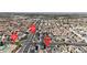 Expansive aerial view of a well-planned community featuring numerous homes and convenient access to major roads at 8436 Noir Ave, Las Vegas, NV 89129