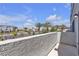 Balcony overlooking desert landscape with palm trees and residential area at 8436 Noir Ave, Las Vegas, NV 89129