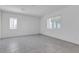 Bright bedroom featuring a modern window for natural light and tile floors at 8436 Noir Ave, Las Vegas, NV 89129