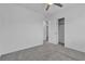 Bedroom features carpeted floors, a ceiling fan, and a walk-in closet at 8436 Noir Ave, Las Vegas, NV 89129